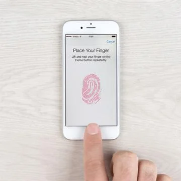 Touch ID application on an iPhone 6 display Foto stock