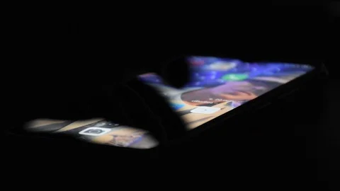 Touch the mobile phone chat chat at night Stock Footage 128812574