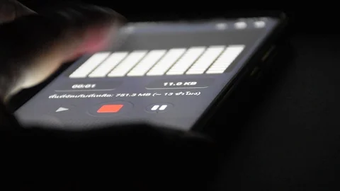 Touch the mobile phone at night Stock Footage 128812570