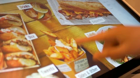 Touch screen display ordering machine in a fast food restaurant (Bageterie Boule Video stock 124864536