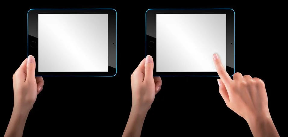 Touch screen tablet computer with hand Stock Photos