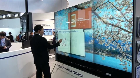Touch screens and interactive glass solutions on exhibition Cebit 2017 in Stock Footage 80895694