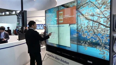 Touch screens and interactive glass solutions on exhibition Cebit 2017 in Video stock 80895981
