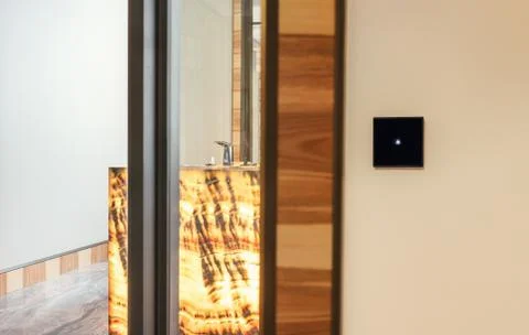 Touch switch in the beautiful interior Stock Photos