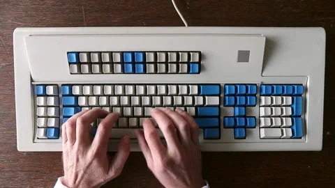 Touch typing on a big vintage Model M clicky keyboard with blank keys Stock Footage 144498913