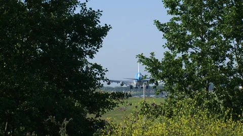 Touchdown large boeing airplane with a cloud of smoke Stock Footage 39624307