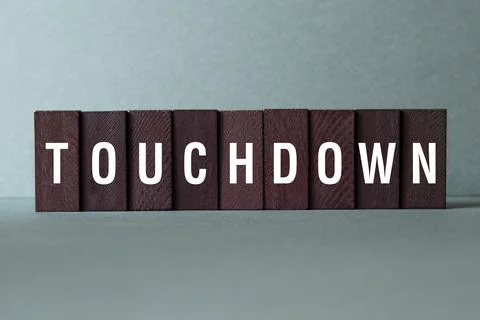 Touchdown - word concept on building blocks, text Stock Photos