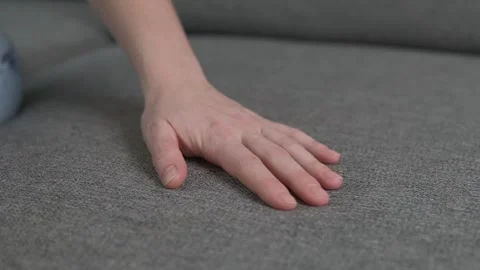 Touching gray fabric couch surface at furniture shop for home. Stock Footage 258000155