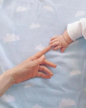 Touching hands Stock Photos