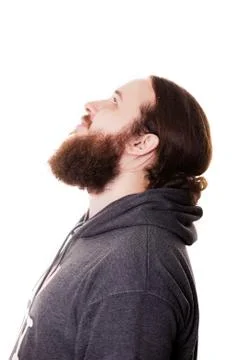 Touching his perfect beard. Close-up of young bearded man touching his beard Foto stock