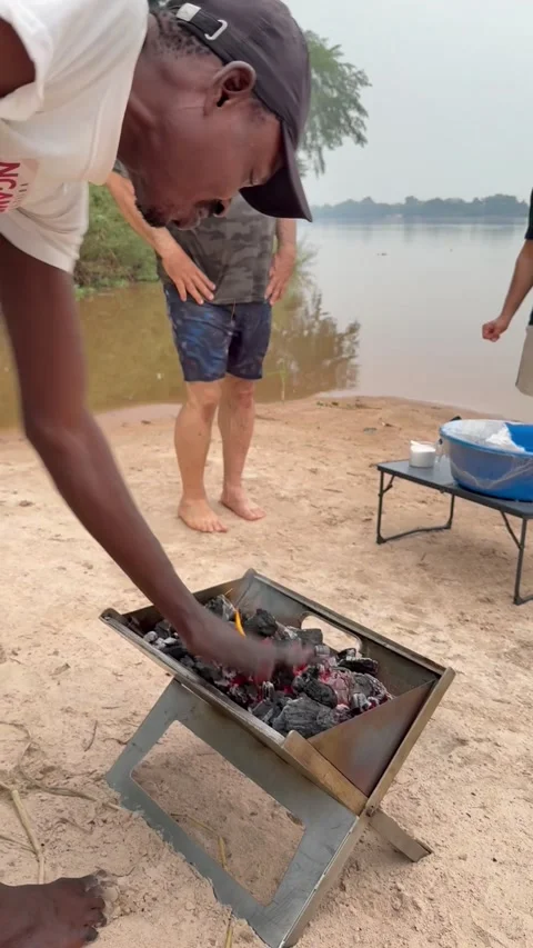 Touching Hot Coals on the Beach, Democratic Republic of the Congo - 23 Sep 2025 스톡 동영상 317656253
