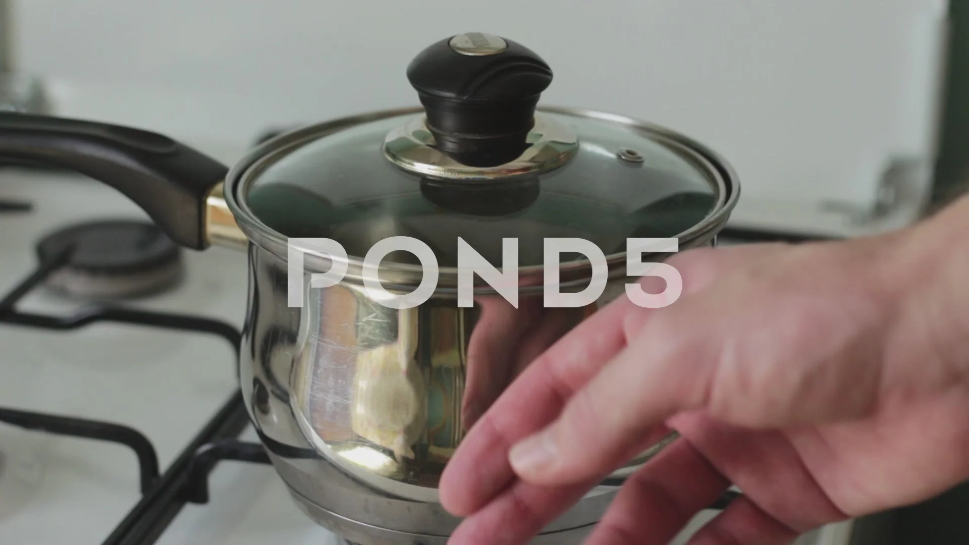 https://images.pond5.com/touching-hot-pan-and-burning-066754111_prevstill.jpeg