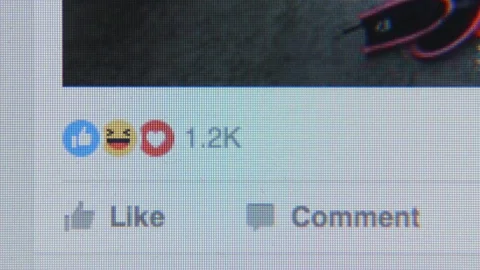 Touching to the icon (Like) in Facebook site - close up Stock Footage 70044517