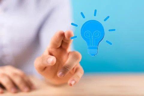 A  touching light bulbs, new ideas with innovative technology and creativity. Stock Photos
