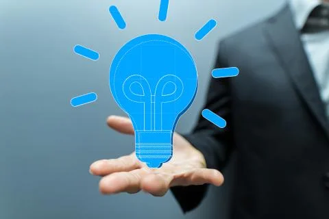 A  touching light bulbs, new ideas with innovative technology and creativity. Stock Photos