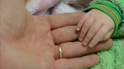 Touching Newborn Baby's Hands Stock Footage 47719588