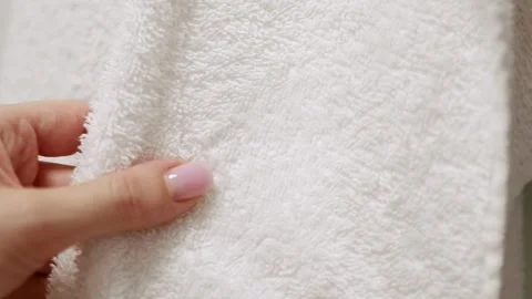 Touching soft white bath towel surface concept of fabric softness Vídeo Stock 331458798