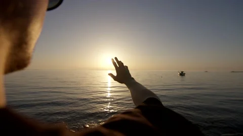 Touching sun Stock Footage 222930543