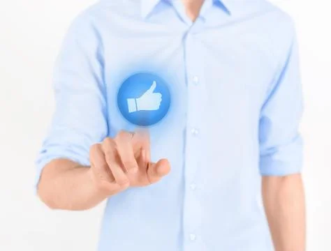Touching thumb up button Stock Photos