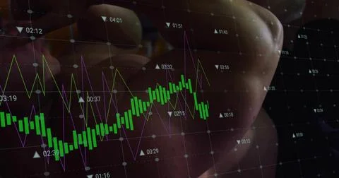Touching trader's hand moving over trading screen at dim workstation, showing Stock Photos