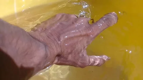 Touching the water Stock Footage 169835792