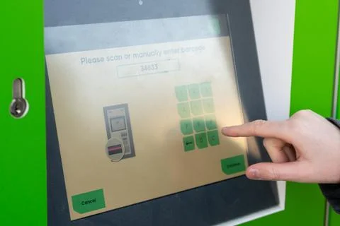 Touchscreen interface on parcel locker terminal Stock Photos