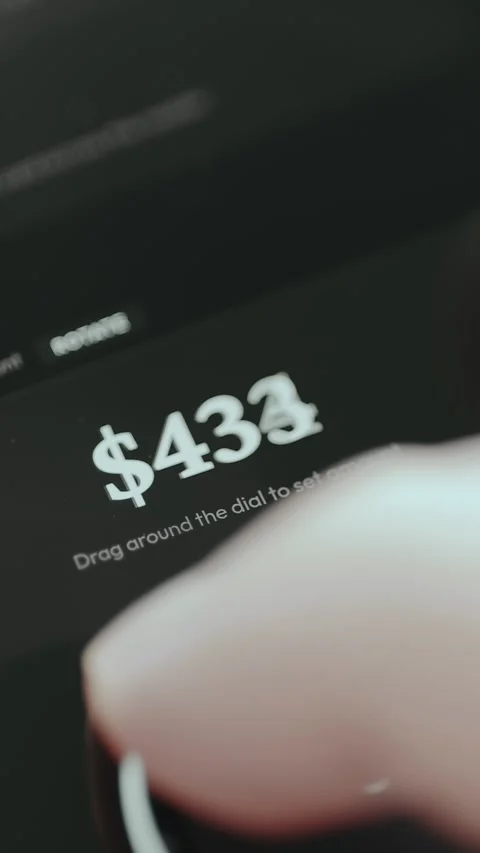 Touchscreen interface showing arrow moved to set payment amount Stock Footage 332500913