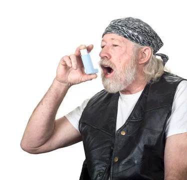 Tough old guy using an inhaler Stock Photos