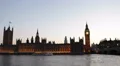 Tour Boats Passing Dusk Light Westminster Palace London Parliament Landmarks UK HD Footage