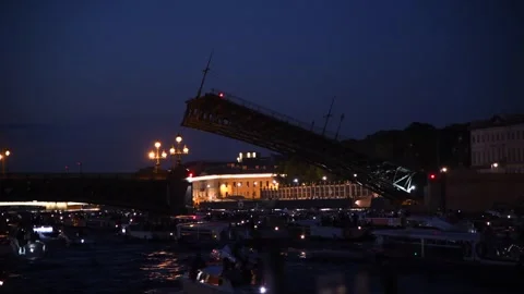 Tour boats sails by opening Trinity bascule bridge at night Stock Footage 248707065