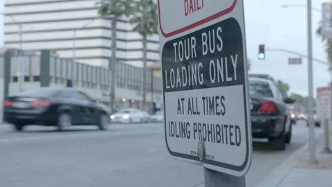 Tour Bus Loading Only Street Parking Sign in City Stock Footage 344615488