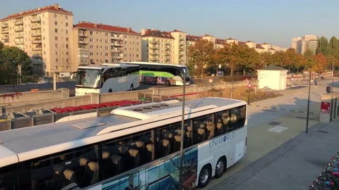 Tour Buses waiting by river Stock Footage 170585147