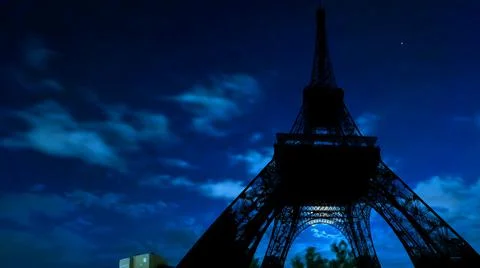 Tour Eiffel at night with fullmoon Stock Photos