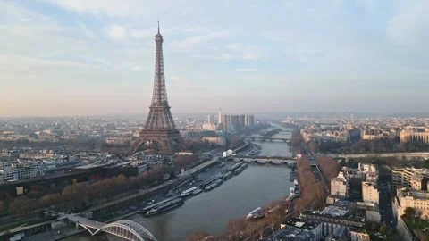 Tour Eiffel tower and Seine River, Paris in France. Aerial drone backward Stock Footage 273671513