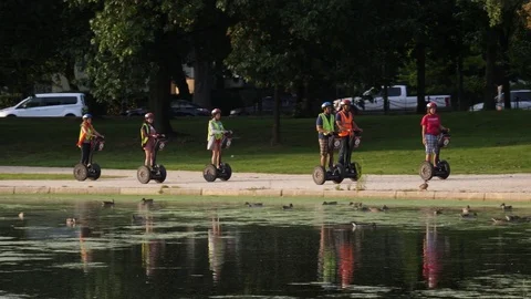 Tour Group of People on Segways Viewing Washington DC Summer Day Stock Footage