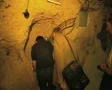 Tour group walking through caves SD Footage