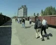 Tour group walking through train station SD Footage