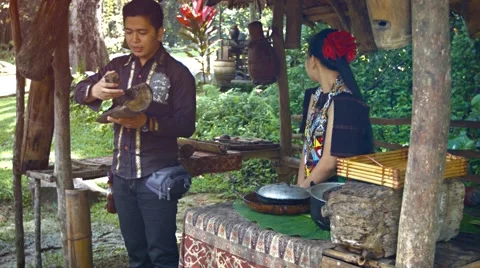 Tour guide gives educational talk about traditional beekeeping practices Stock Footage 63575398