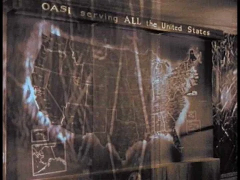 A tour guide at the Social Security Headquarters uses a giant map to show where Stock Footage 75789688