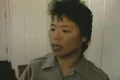 Tour guide talking about JFK's birthplace to woman Footage