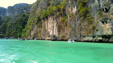 Tour to the Phi Phi Islands, turquoise water, boat, mountains, beautiful nature Stock Footage 247915881