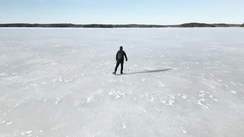 Touring skater on the ice on spring Video stock 267602137