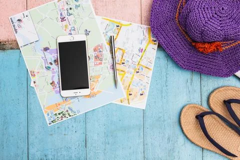 Tourism and objects concept - close up ,smartphone and touristic map Stock Photos