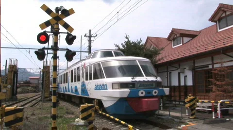 Tourism train for Mount Fuji arrives at Fujikyu Station. Japan. Stock Footage