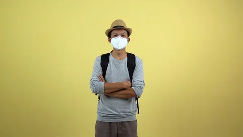 A tourism using a mask for protect an air toxic for travel around the world. Stock Footage 123777853