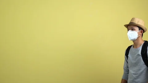 A tourism using a smart phone for checking an air toxic in real time. Stock Footage 123778840