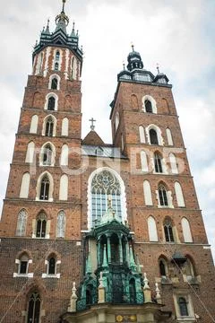 Tourist architectural attractions in the historical square of Krakow Stock Photos