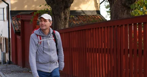 Tourist with backpack in a city Video stock 97764444