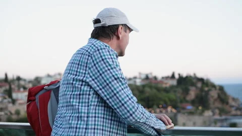 Tourist with backpack looking around Stock-Footage 87619039