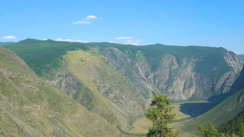 A tourist with a backpack in the mountains. Stock Footage 93452608